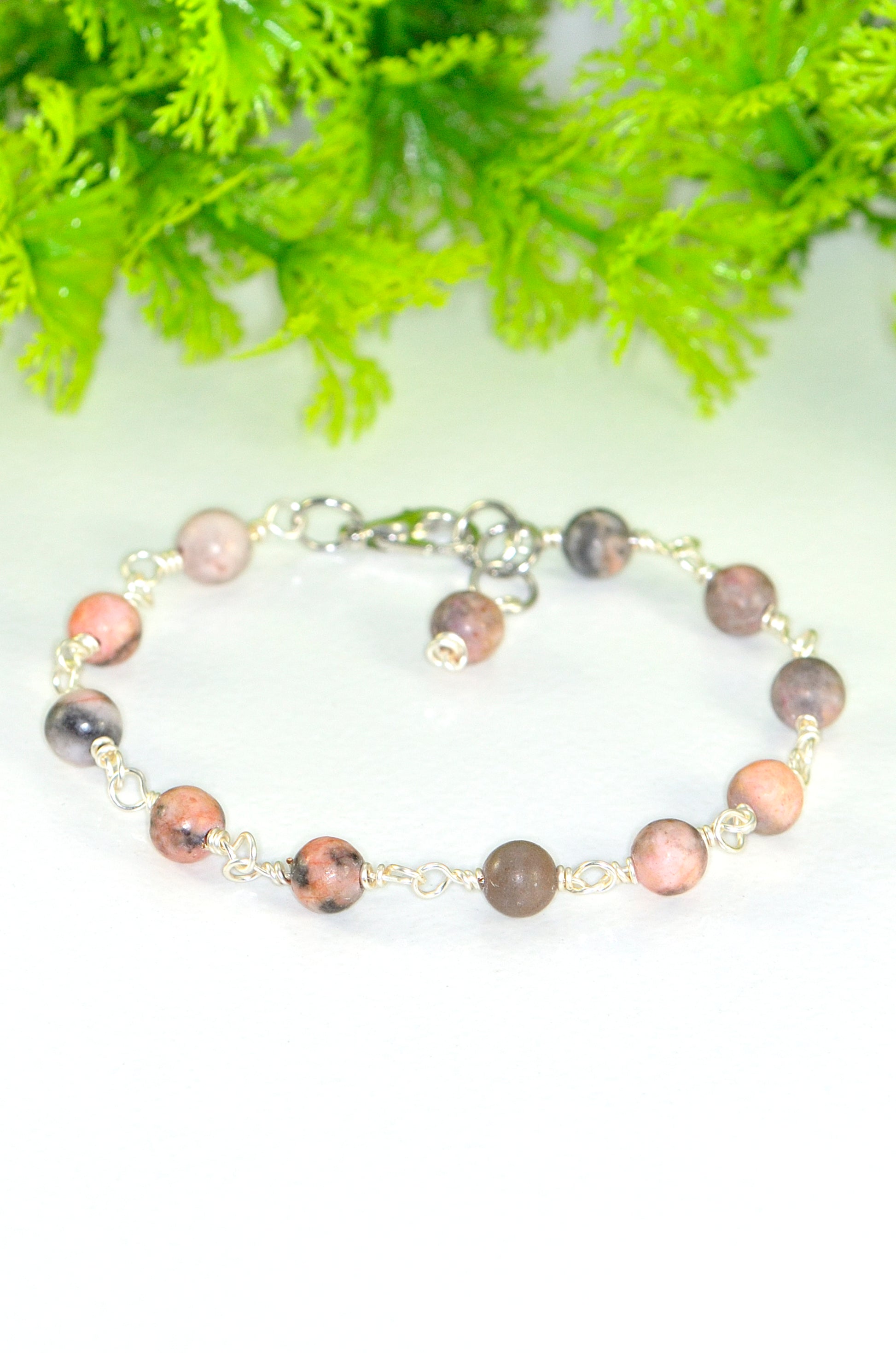 Close up of 6mm Pink Zebra Jasper Link Bracelet.