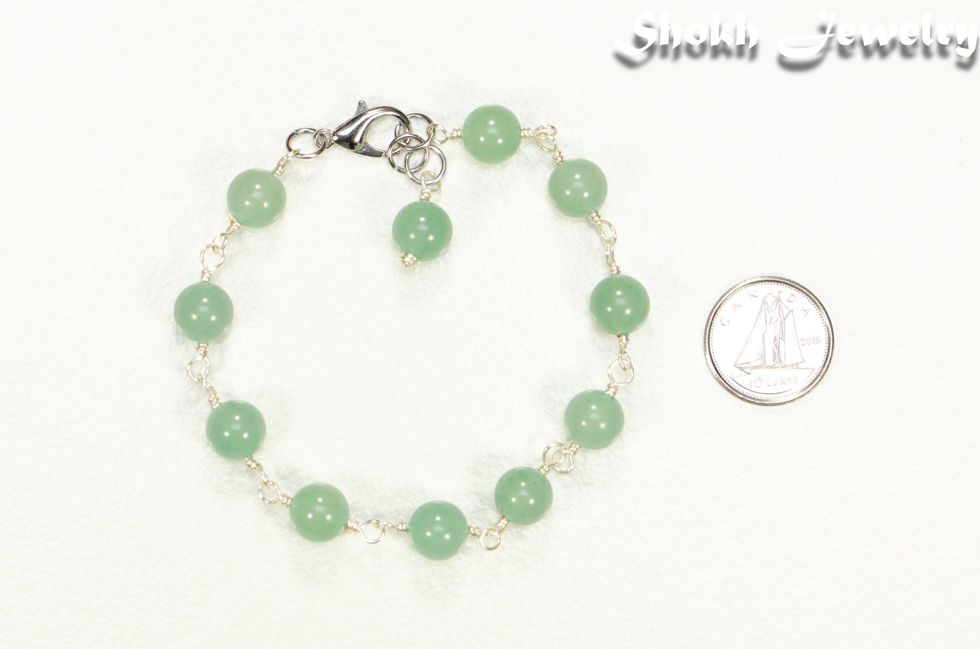 8mm Green Aventurine Link Anklet beside a dime.