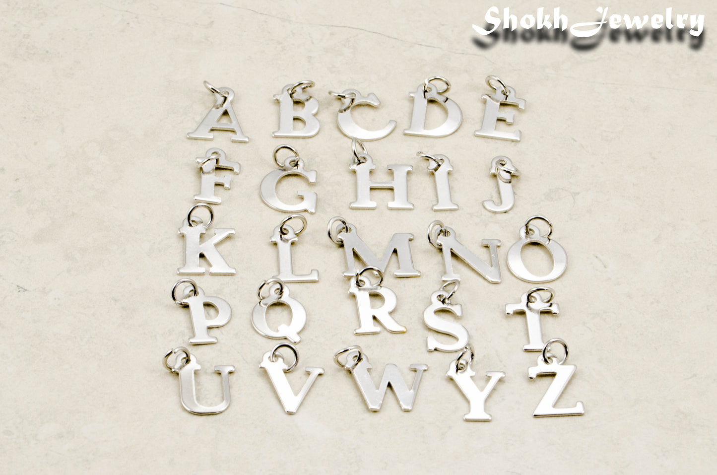 Alphabet charms A to Z letters.