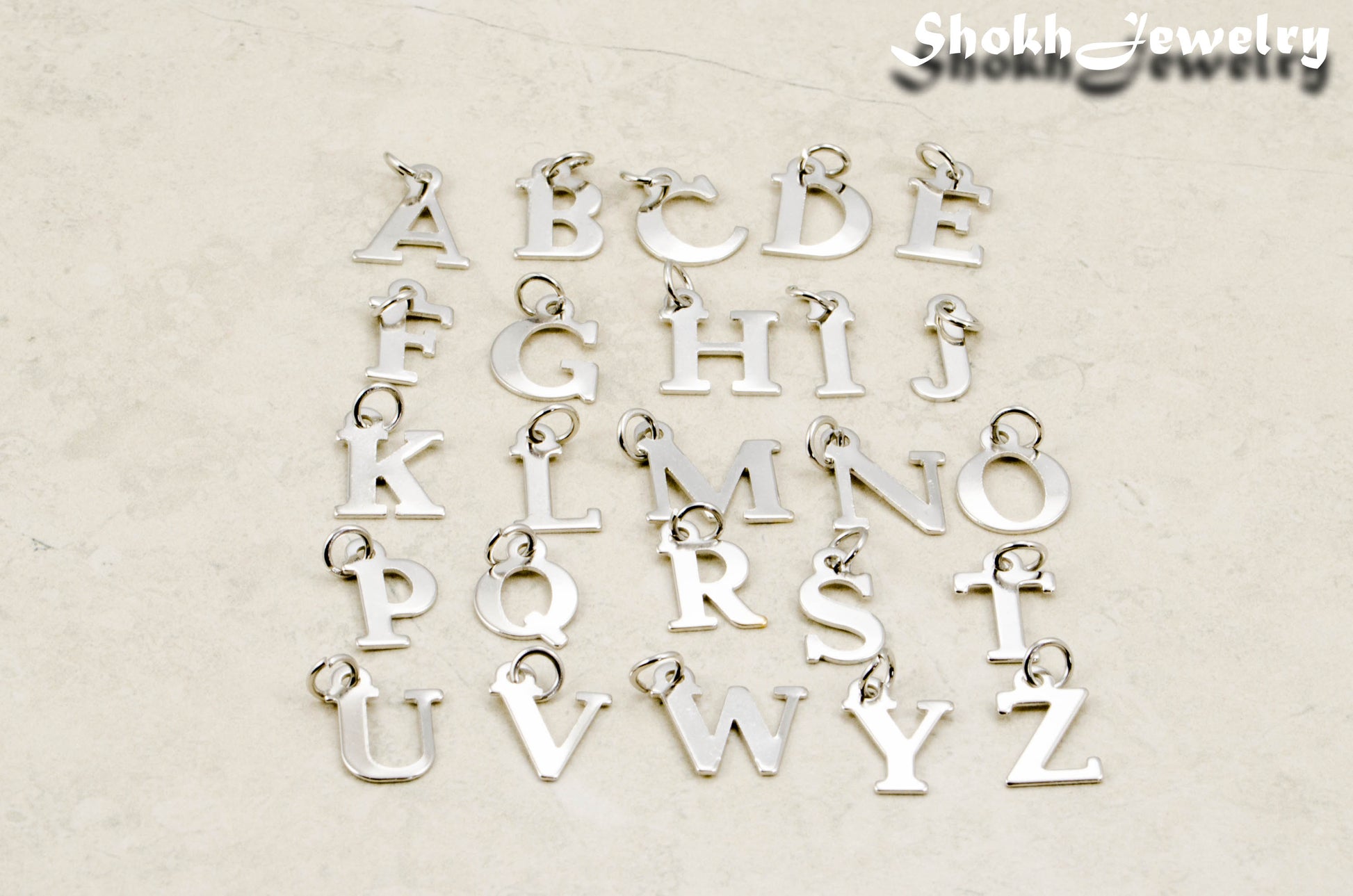 Alphabet charms A to Z letters.