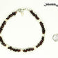 Freshwater Pearls and Garnet Crystal Chip Choker Necklace beside a dime.
