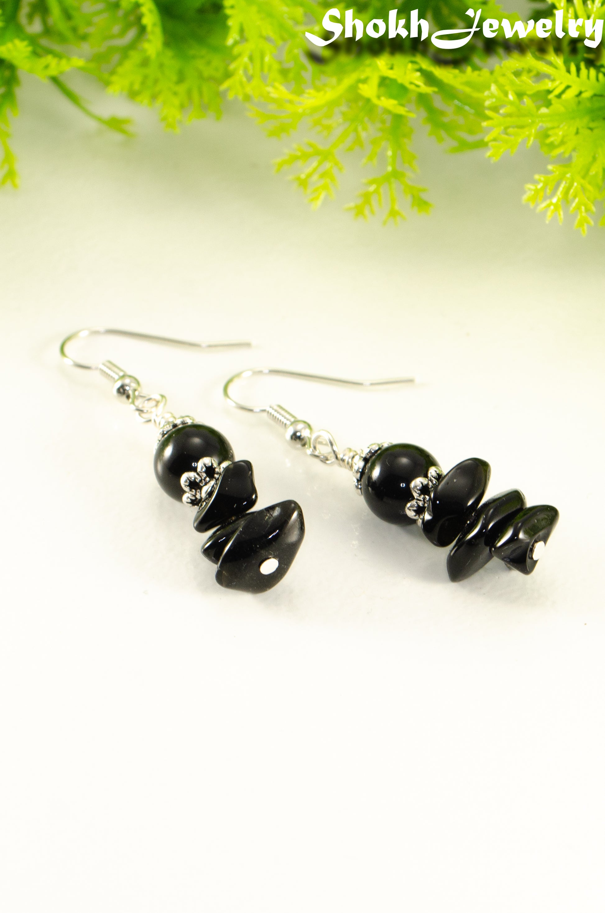 Close up of Simple  Black Obsidian Crystal Chip Earrings.