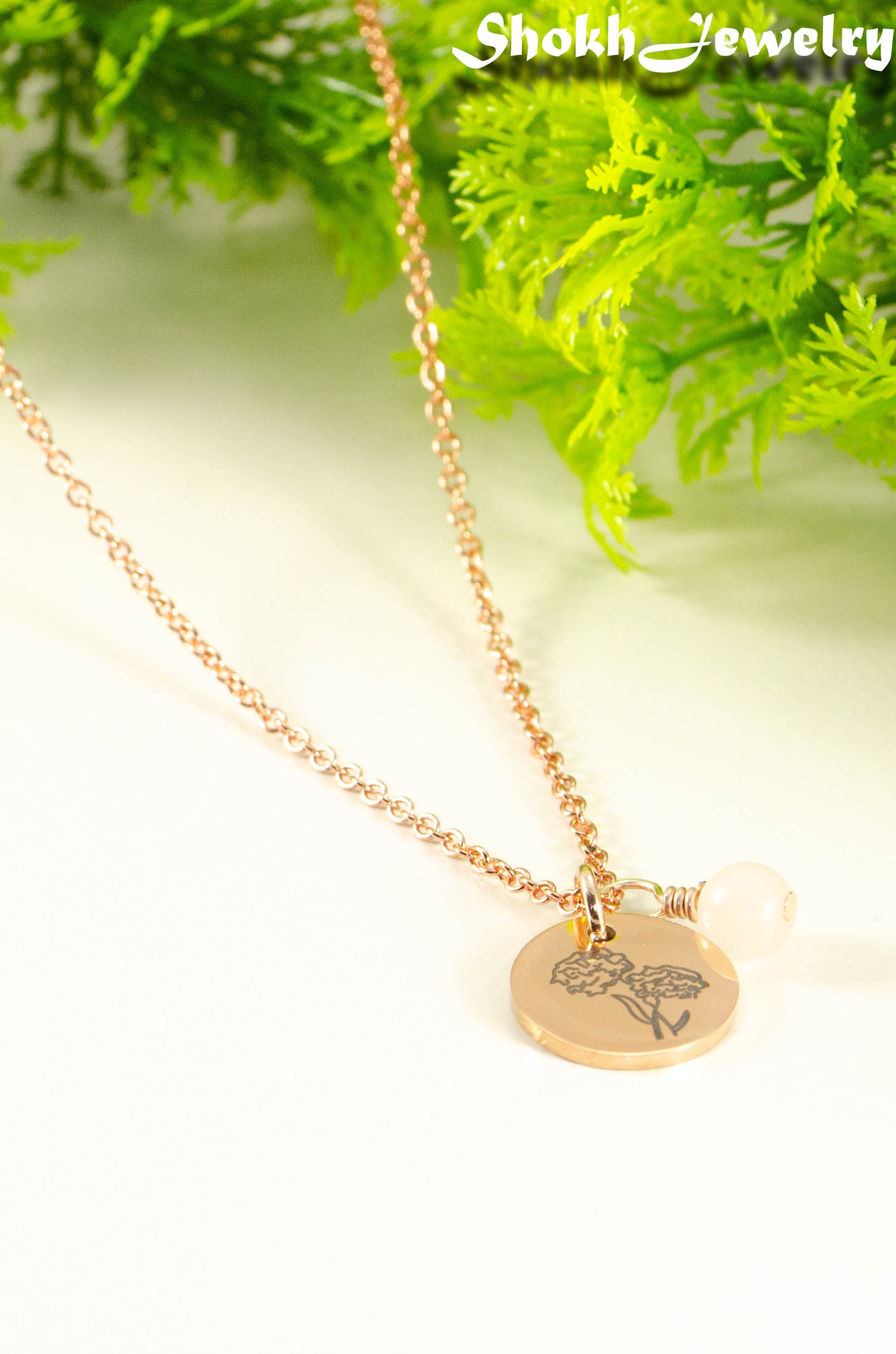 Rose Gold Plated October Birth Flower Necklace with Rose Quartz Birthstone Pendant.