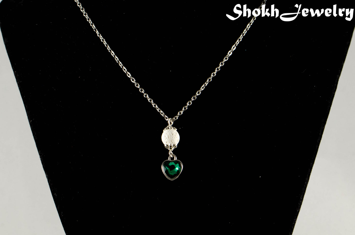 Lava Rock and Heart Shaped May Birthstone Choker Necklace displayed on a bust.