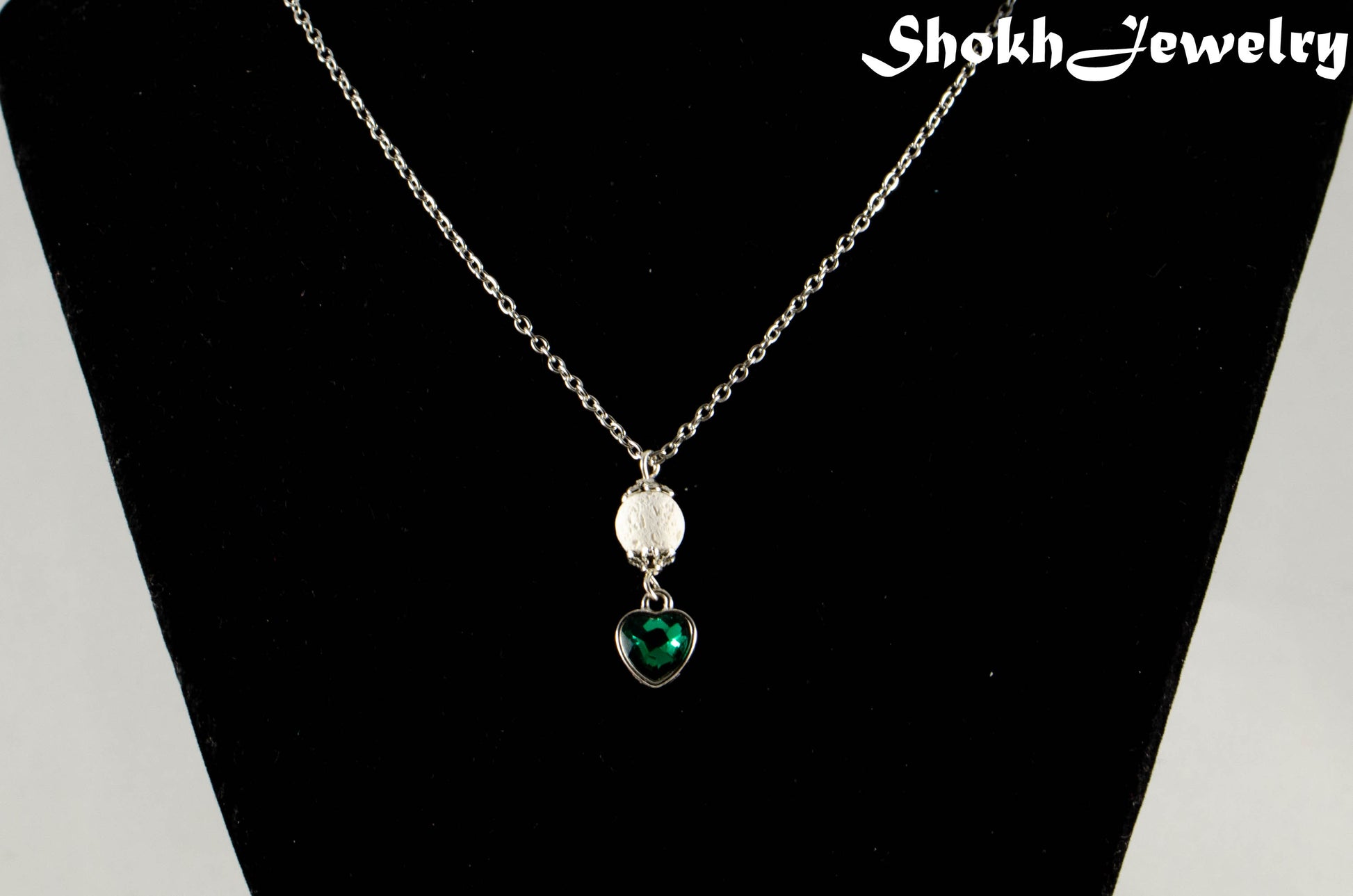 Lava Rock and Heart Shaped May Birthstone Choker Necklace displayed on a bust.