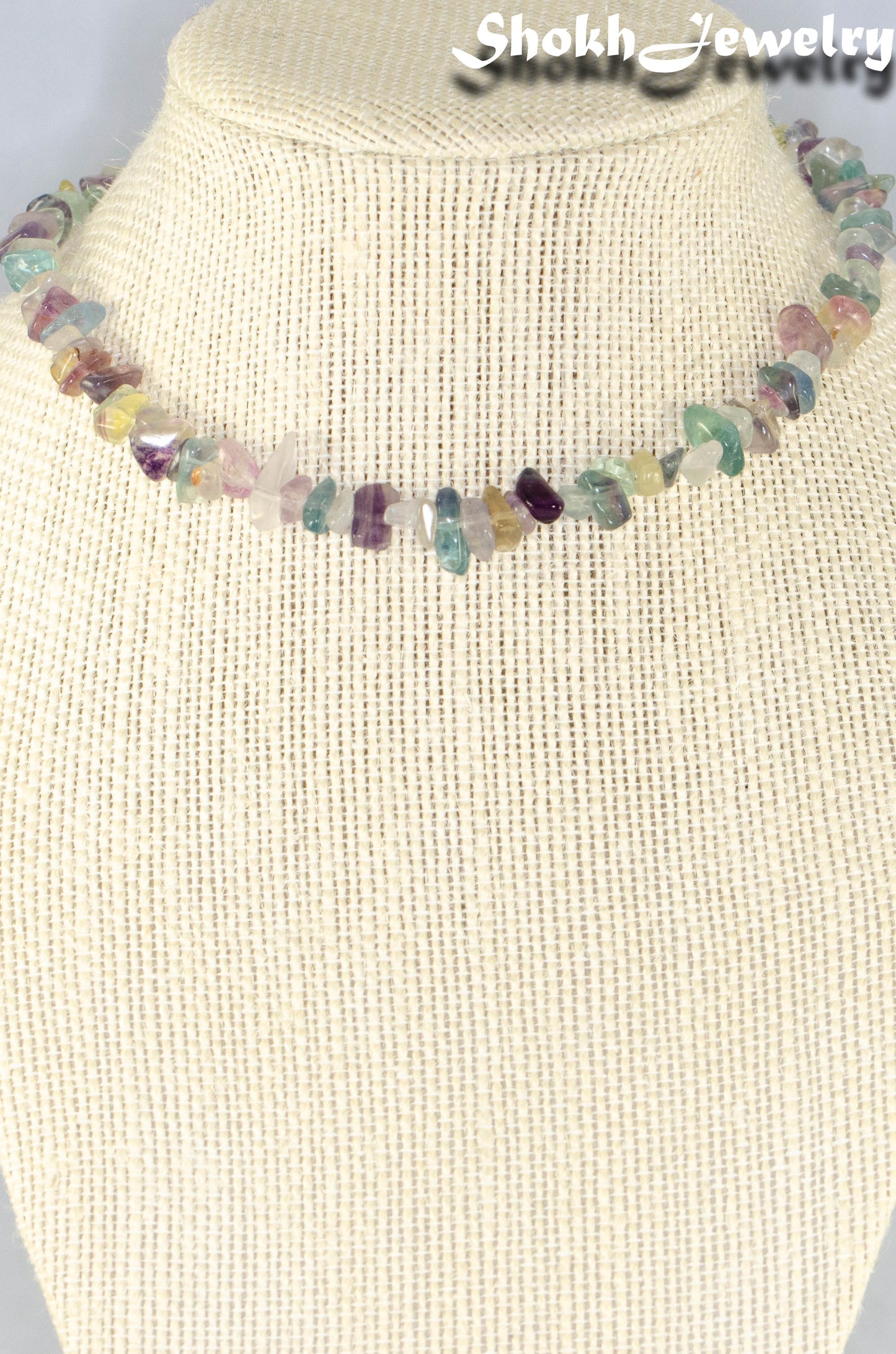 Natural Rainbow Fluorite Crystal Chip Choker Necklace displayed on a bust.