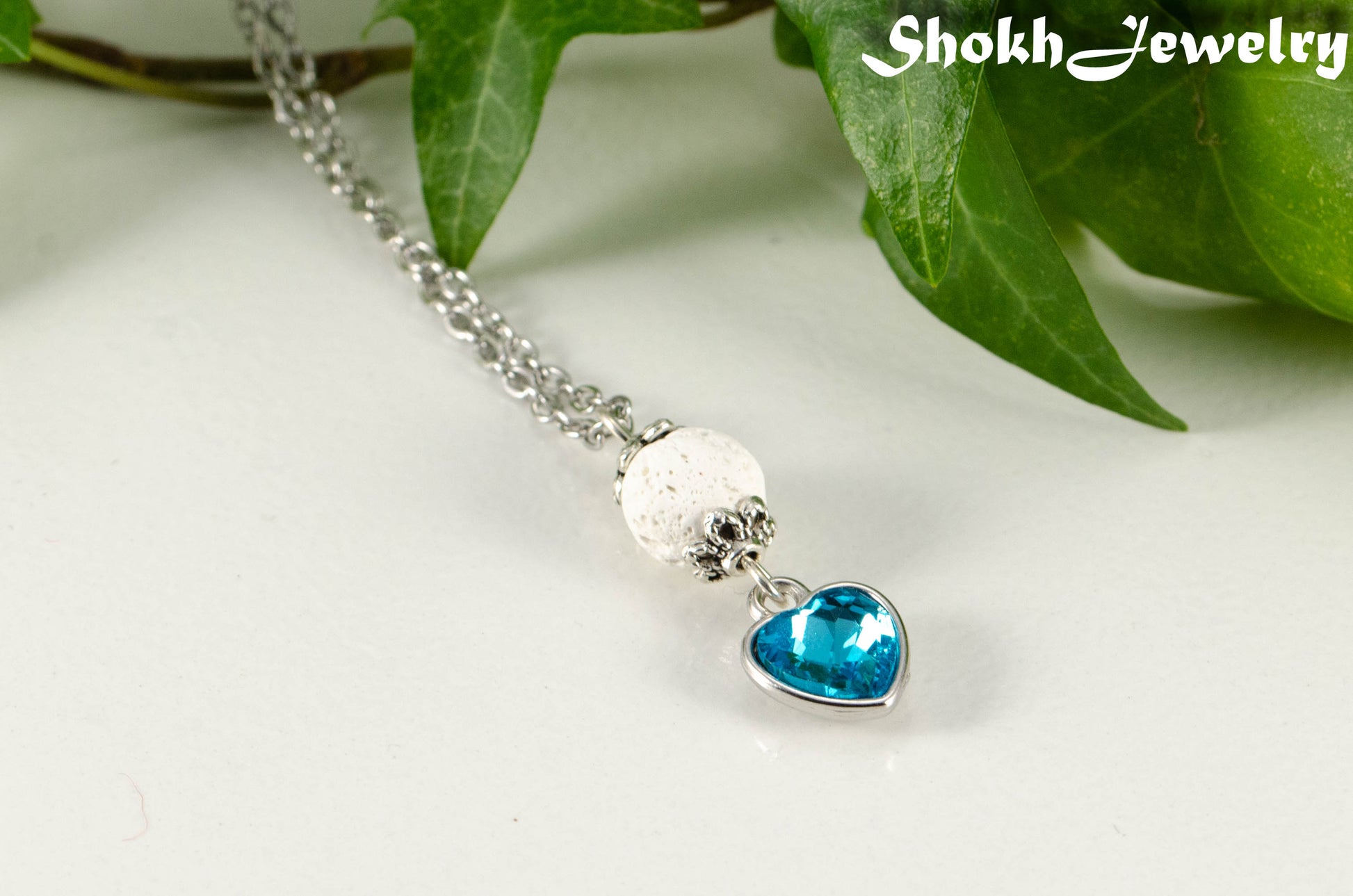 Close up of Lava Rock and Heart Shaped March Birthstone Choker Necklace.