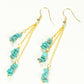 Top view of Long Gold Plated Chain and Turquoise Crystal Chip Earrings