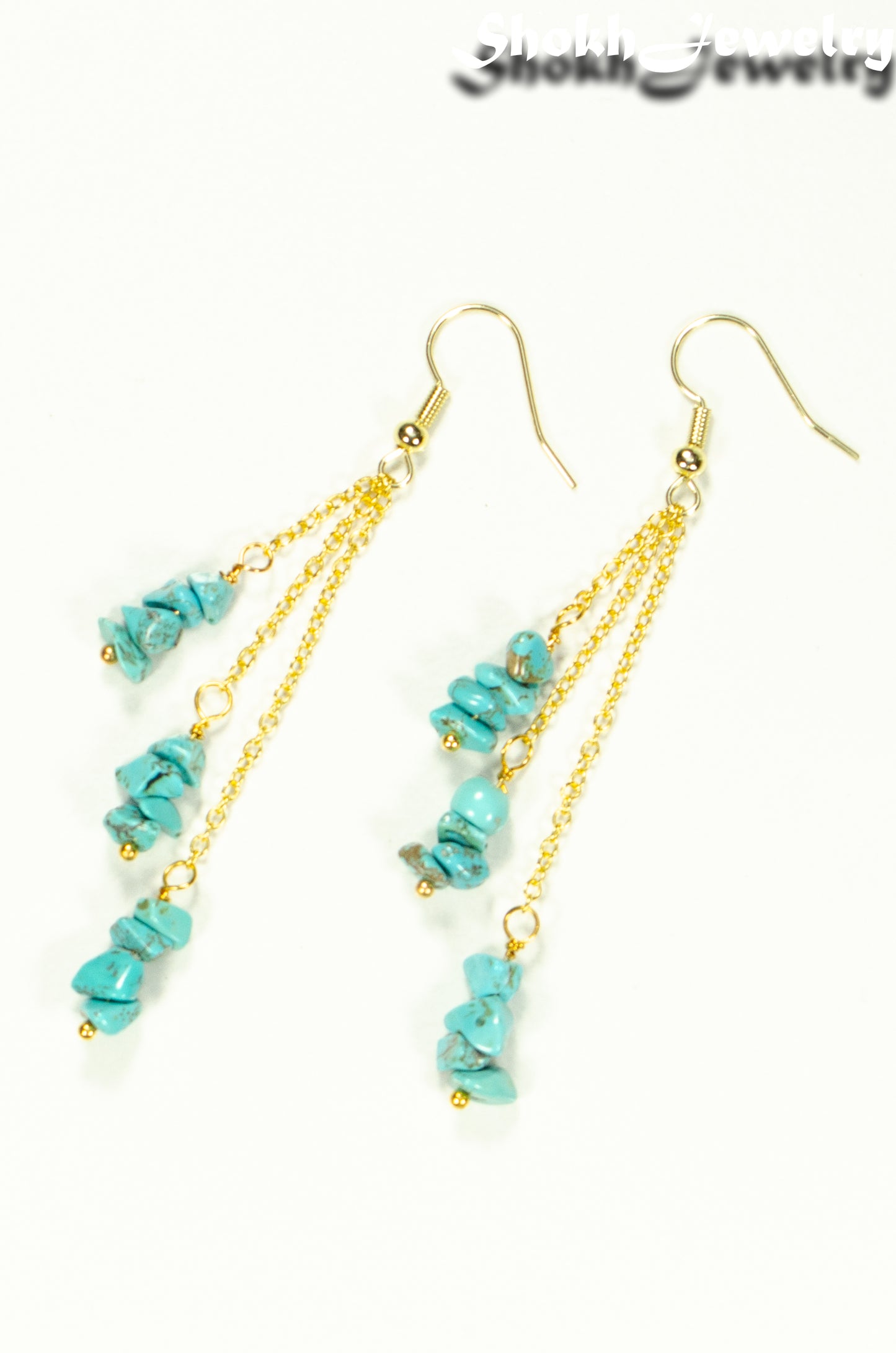 Top view of Long Gold Plated Chain and Turquoise Crystal Chip Earrings