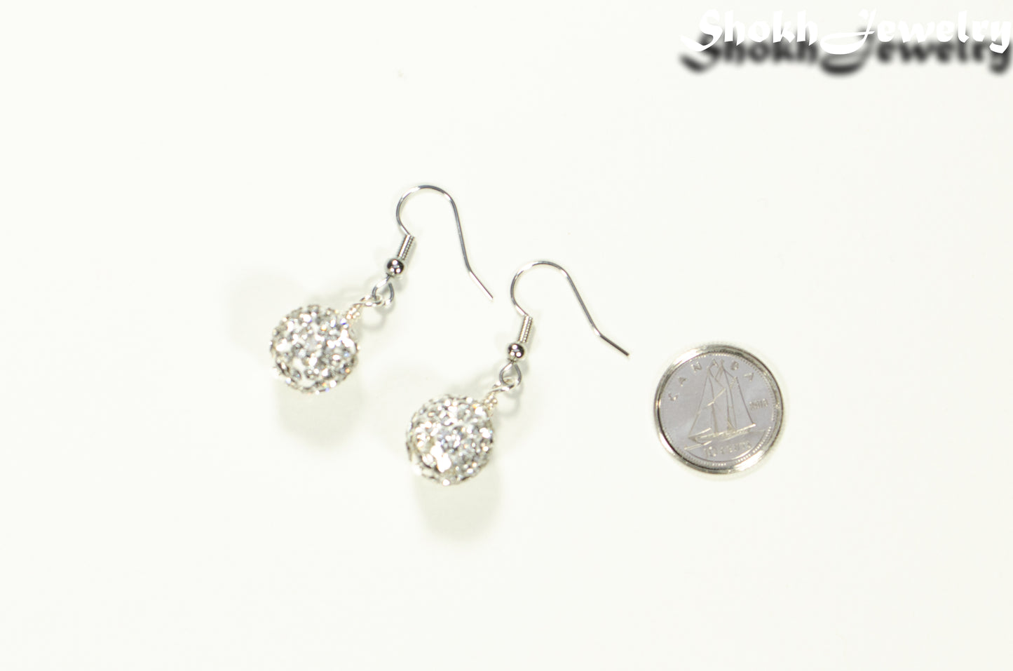 12mm Rhinestone Disco Ball Earrings beside a dime.