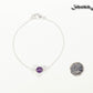 Minimal Amethyst Bracelet beside a dime.