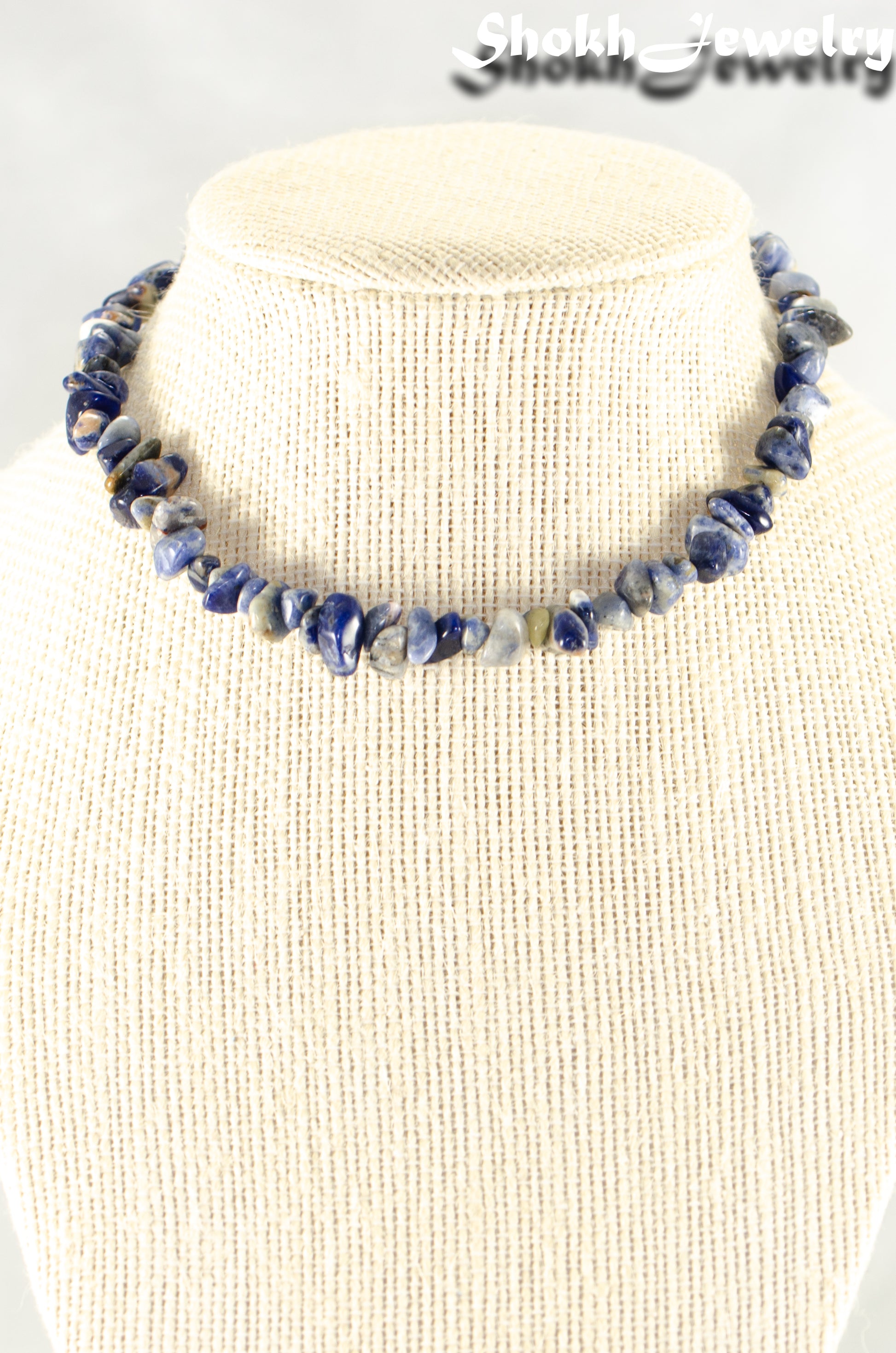 Close up of Natural Sodalite Crystal Chip Choker Necklace.