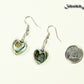 Heart Shaped Abalone Shell Earrings beside a dime.