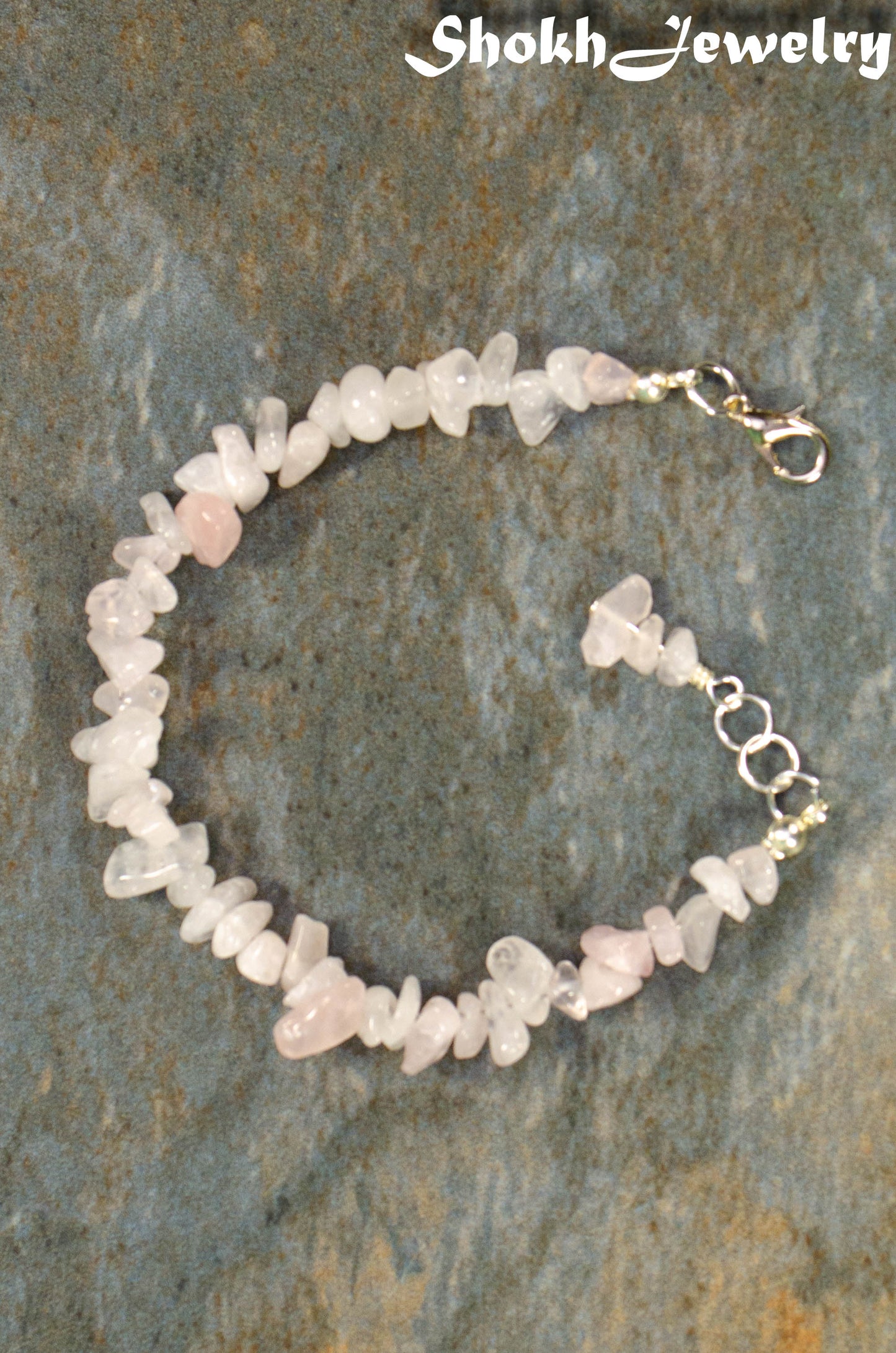 Top view of Natural Rose Quartz Crystal Chip Bracelet.