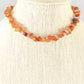 Natural Carnelian Crystal Chip Choker Necklace displayed on a bust.
