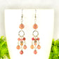 Close up of Statement Pink Rhodonite Chandelier Earrings.