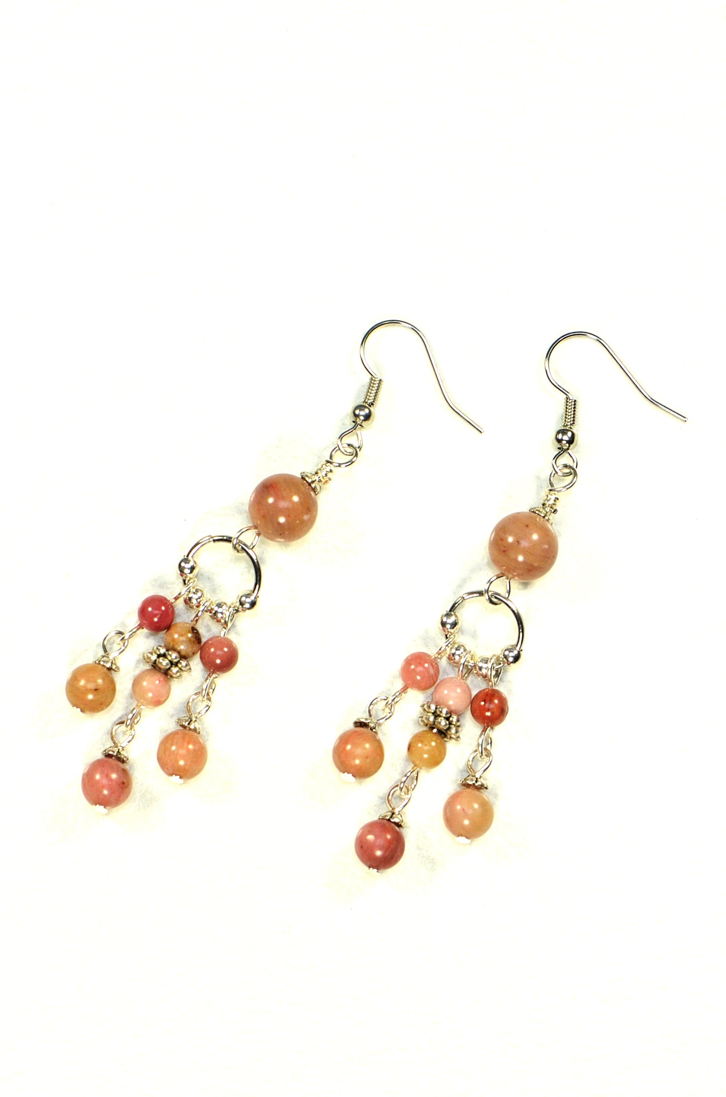 Top view of Statement Pink Rhodonite Chandelier Earrings.