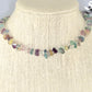 Natural Rainbow Fluorite Crystal Chip Choker Necklace displayed on a bust