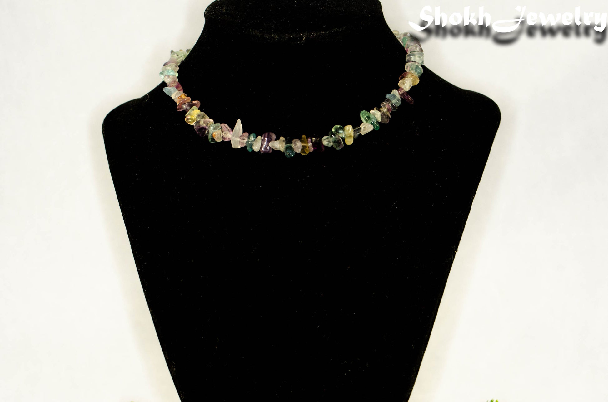 Natural Rainbow Fluorite Crystal Chip Choker Necklace displayed on a bust